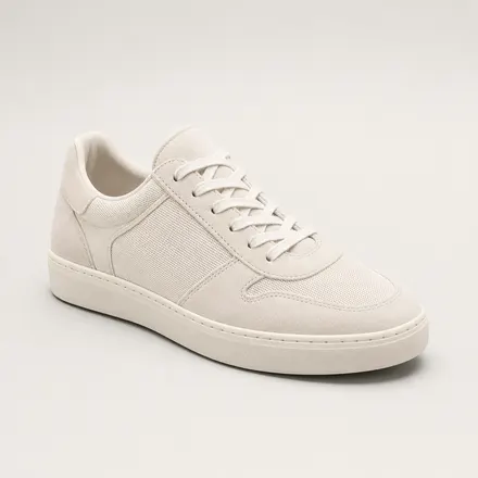A photo of an off white low top sneaker
